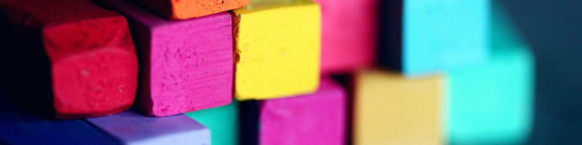 pexels-photo-1148496-1148496 Close-up of stacked colorful pastel chalks, showcasing a vibrant array of colors and textures.